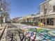 Street view with a colorful painted design and local businesses, creating a vibrant cultural scene at 5703 Ammons St, Arvada, CO 80002