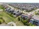 Aerial view showcases a well-planned community and a lovely home with lush backyard at 8142 S Langdale Way, Aurora, CO 80016