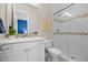Modern bathroom with white cabinets, glass shower, and decorative mosaic accents at 8142 S Langdale Way, Aurora, CO 80016