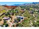 A home in a serene, verdant neighborhood, outlined for visual clarity, showcases its unique location at 5799 Crestbrook Cir, Morrison, CO 80465