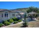 An inviting backyard features a gazebo, patio furniture, and lush landscaping for relaxing and entertaining at 5799 Crestbrook Cir, Morrison, CO 80465