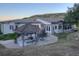 Enjoy outdoor living in this backyard with a gazebo, patio, dining set, and views of rolling hills at 5799 Crestbrook Cir, Morrison, CO 80465