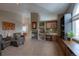 Cozy living room with a fireplace, built-in shelving, and comfortable seating at 5799 Crestbrook Cir, Morrison, CO 80465