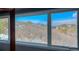 Stunning view from the windows showing trees and mountains in the background at 5799 Crestbrook Cir, Morrison, CO 80465