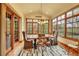Bright dining room with large windows and stylish furnishings, perfect for entertaining at 1423 E Fair Pl, Centennial, CO 80121