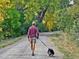 Scenic neighborhood path with mature trees, perfect for walking or enjoying nature with pets at 1423 E Fair Pl, Centennial, CO 80121