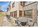 Inviting outdoor patio with stone accents and seating area, perfect for entertaining guests at 1423 E Fair Pl, Centennial, CO 80121