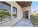 A shot of the balcony with views of the skyline and trees at 1780 N Washington St # 203, Denver, CO 80203