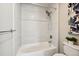 Beautiful white tiled corner shower at 1780 N Washington St # 203, Denver, CO 80203