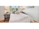 Bedroom features a bright window view and calming paint at 1780 N Washington St # 203, Denver, CO 80203
