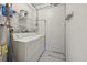 Functional laundry room with modern washer and dryer units and ample storage space at 1780 N Washington St # 203, Denver, CO 80203