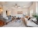 A bright, airy living room with modern decor and hardwood floors at 1780 N Washington St # 203, Denver, CO 80203