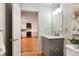 Powder room looking into the kitchen at 1780 N Washington St # 203, Denver, CO 80203