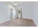 Bright bedroom with natural light showcases an attached full bathroom at 1273 S Jackson St, Denver, CO 80210