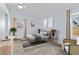 Cozy bedroom features neutral tones, natural light, and comfortable modern decor at 1273 S Jackson St, Denver, CO 80210