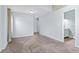 Large, airy bedroom with an ensuite bathroom creating a luxurious retreat at 1273 S Jackson St, Denver, CO 80210