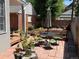 Relaxing backyard patio with a dining table, outdoor seating, and planters at 724 N Franklin St, Denver, CO 80218