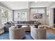 Bright living room boasts generous seating, natural light, and stylish decor creating a welcoming atmosphere at 724 N Franklin St, Denver, CO 80218