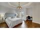 Bedroom with hardwood floors and access to a balcony at 1827 N Grant St # 1000, Denver, CO 80203