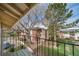 Apartment balcony with view to trees and complex at 12113 Melody Dr # 304, Denver, CO 80234