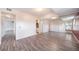 Bright bedroom with hardwood floors and a large mirrorred closet at 12113 Melody Dr # 304, Denver, CO 80234