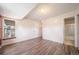 Bright bedroom with hardwood floors and a view to the outside at 12113 Melody Dr # 304, Denver, CO 80234