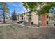 A charming two-story apartment building featuring multiple balconies and an inviting facade at 12113 Melody Dr # 304, Denver, CO 80234