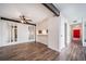 Bright living room featuring sleek flooring and stylish mirrored wall accents at 12113 Melody Dr # 304, Denver, CO 80234
