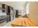 Updated kitchen featuring butcher block countertops and stainless steel appliances at 4328 S Carr Ct, Littleton, CO 80123