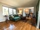 Bright living room featuring hardwood floors and a large window at 4328 S Carr Ct, Littleton, CO 80123