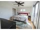 Comfortable main bedroom with hardwood floors, natural light, and closet at 4328 S Carr Ct, Littleton, CO 80123
