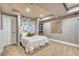 Carpeted bedroom with a single bed and decorative elements at 1410 Old Sequoia Ct, Franktown, CO 80116