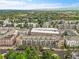 Scenic aerial view of the community, highlighting the buildings, trees, and roads at 7240 W Custer Ave # 301, Lakewood, CO 80226