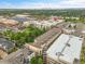 Wide shot showcasing the community's layout, nearby shopping, and a glimpse of the city skyline at 7240 W Custer Ave # 301, Lakewood, CO 80226