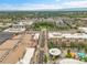 Scenic aerial view of the community with buildings, landscaping, and road at 7240 W Custer Ave # 301, Lakewood, CO 80226