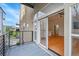 Apartment balcony with metal railings offering an exterior view of the street and building at 7240 W Custer Ave # 301, Lakewood, CO 80226