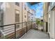 Apartment balcony with metal railings with a view of the nearby buildings at 7240 W Custer Ave # 301, Lakewood, CO 80226