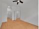 Spacious bedroom with ample natural light, ceiling fan and hardwood floors at 7240 W Custer Ave # 301, Lakewood, CO 80226