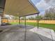 Back patio and lush backyard with newly stained fence perfect for outdoor enjoyment at 920 S Hudson St, Denver, CO 80246