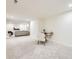 Spacious finished basement featuring a fireplace and an adjacent office nook at 920 S Hudson St, Denver, CO 80246