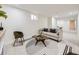 Finished basement featuring a comfortable seating area and a modern rug at 920 S Hudson St, Denver, CO 80246