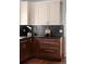 Close up shot of a kitchen showcasing countertops, backsplash and stainless steel sink at 720 S Clayton St, Denver, CO 80209