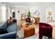Spacious living room with hardwood floors and contemporary furniture at 720 S Clayton St, Denver, CO 80209