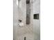Contemporary shower with a wall mounted shower system and a built-in niche at 720 S Clayton St, Denver, CO 80209