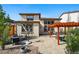 A delightful backyard featuring comfortable seating, outdoor dining, a grill, and a manicured landscape at 15275 W La Salle Ave, Lakewood, CO 80228
