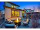 Cozy backyard scene with a fire pit and comfortable seating, perfect for evening gatherings at 15275 W La Salle Ave, Lakewood, CO 80228