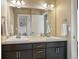 Bathroom with double sinks, vanity, and ample counter space at 15275 W La Salle Ave, Lakewood, CO 80228