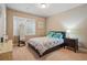 Cozy bedroom with natural light, comfortable bedding, and minimalist decor for a serene atmosphere at 15275 W La Salle Ave, Lakewood, CO 80228
