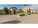 Exterior of stone buildings showcasing unique architecture and manicured landscaping at 15275 W La Salle Ave, Lakewood, CO 80228