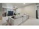 Spacious living room featuring a comfortable sectional sofa, large television, and recessed lighting at 15275 W La Salle Ave, Lakewood, CO 80228
